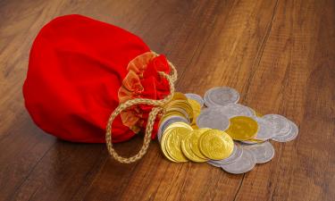 Декабрьский рост золота и серебра связали со слабым долларом — "Альфа-Форекс"