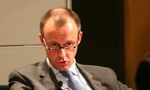 Канцлер Германии требует от сограждан спасать экономику